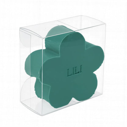 Bloemvormig zeepje met naam in transparant doosje.