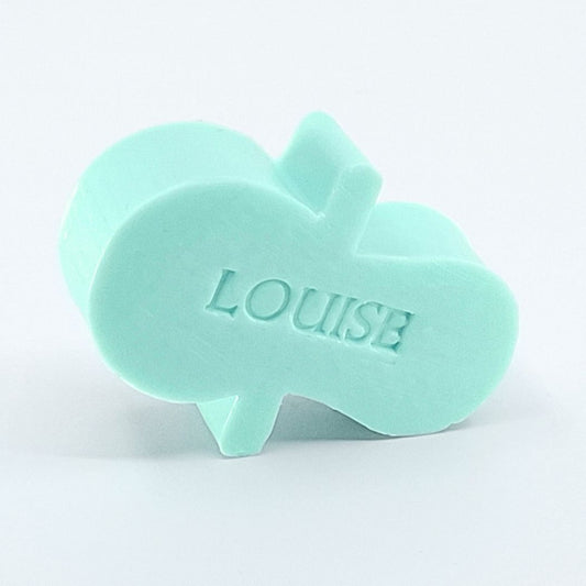 Gepersonaliseerd zeepje met naam in de vorm van een fopspeen in de kleur muguet